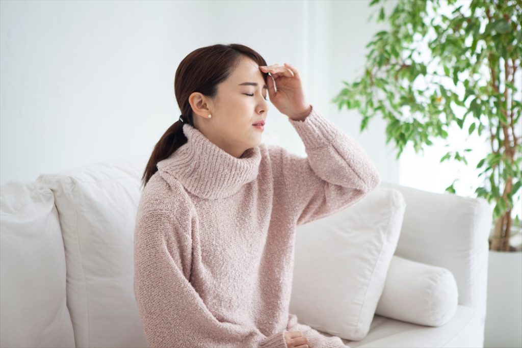 不調の女性